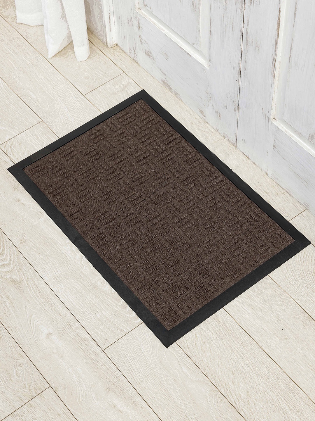

Ariana Brown Self Design Anti-Skid Doormat
