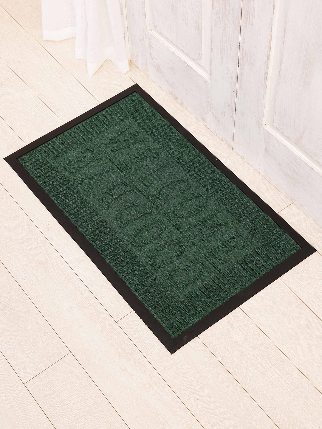 

Ariana Green Self Design Anti-Skid Doormats