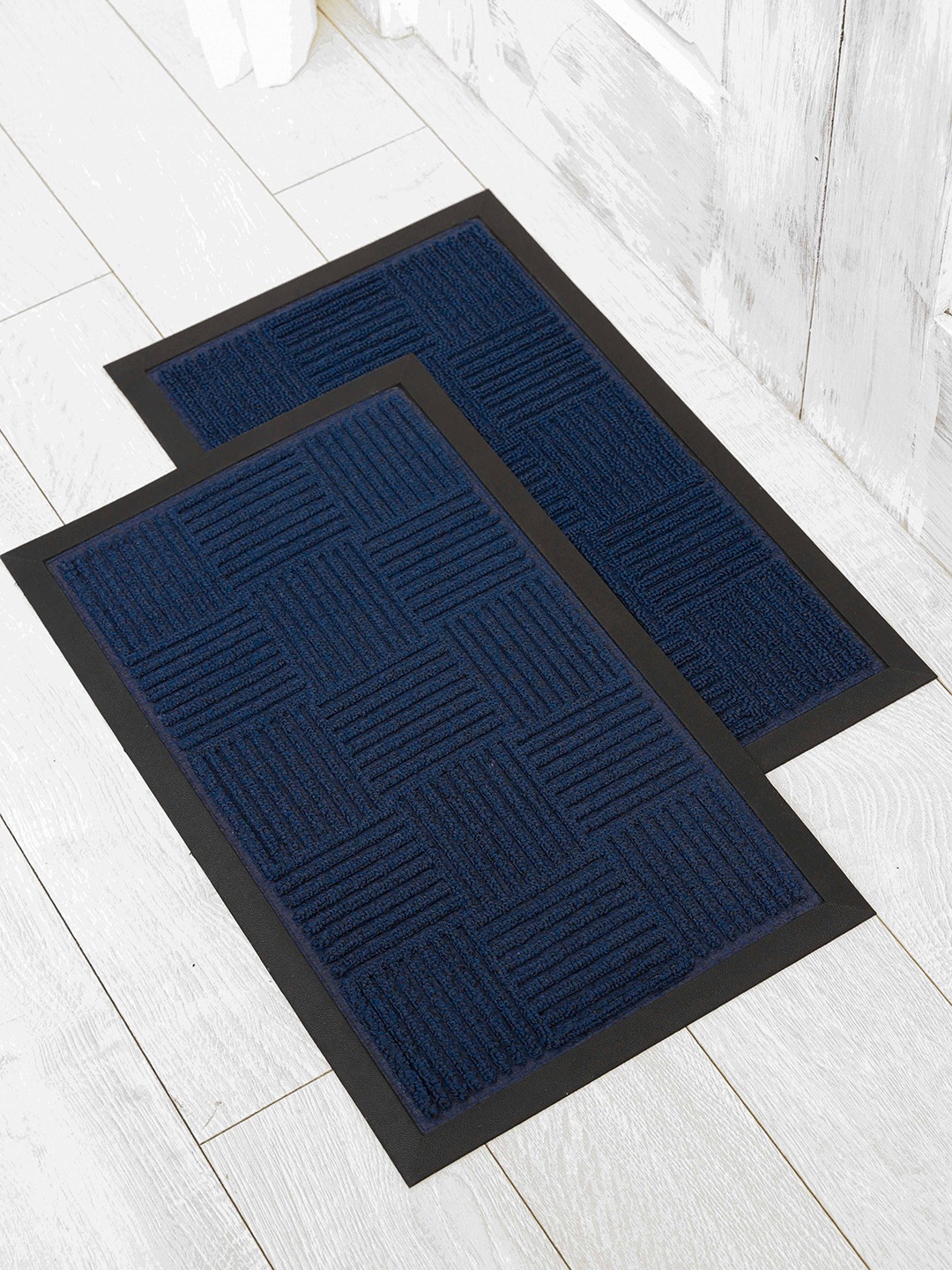 

Ariana Navy blue & Black 2 Pieces Textured Anti-Skid Rectangular Doormats