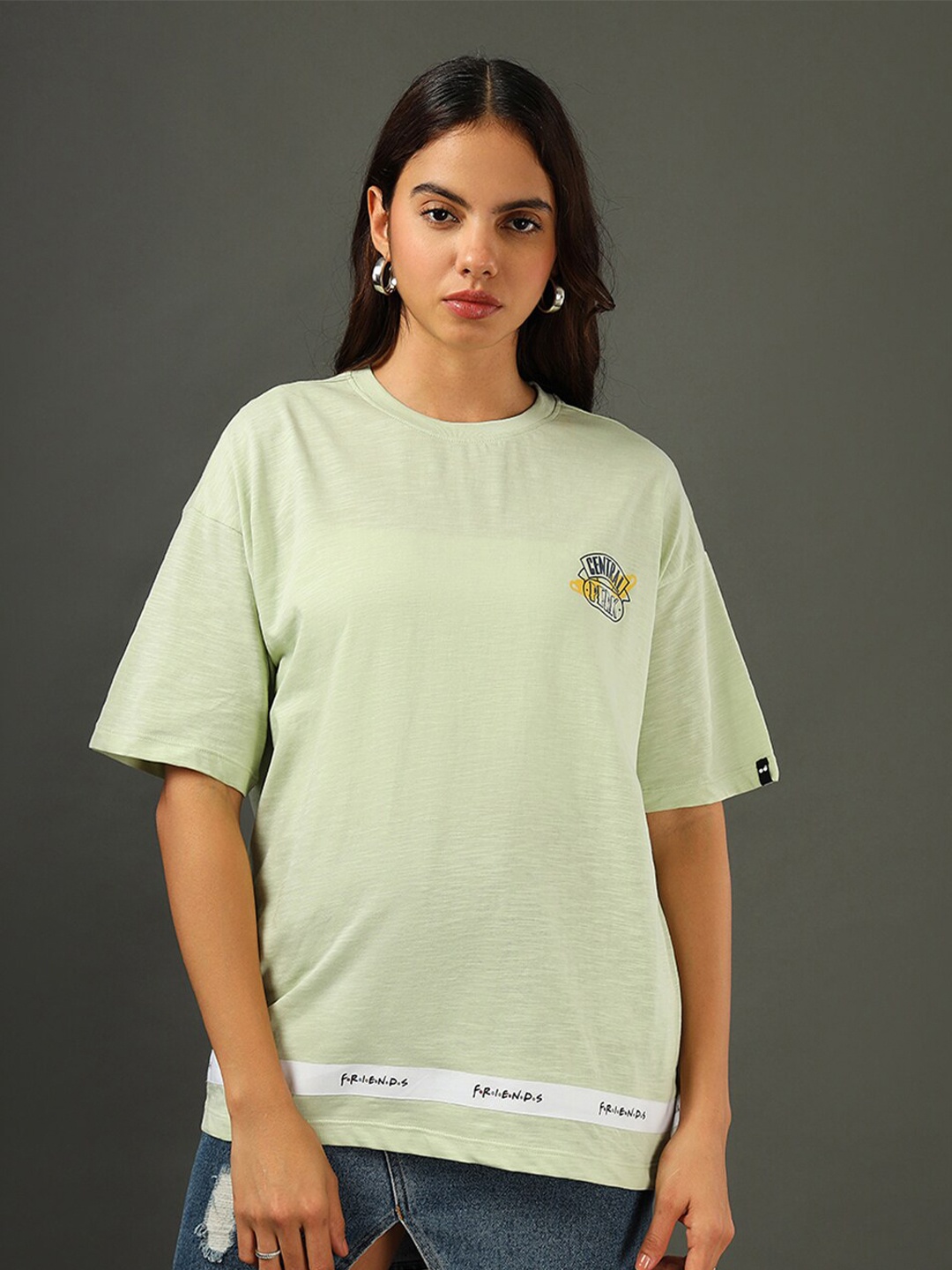 

Bewakoof Air 1.0 Official Friends Women Friends Tape Graphic Printed Oversized T-shirt, Green