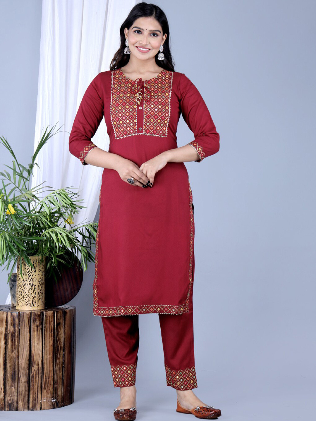 

IkDaiya Ethnic Motifs Embroidered Mirror Work Kurta with Trousers & Dupatta, Maroon
