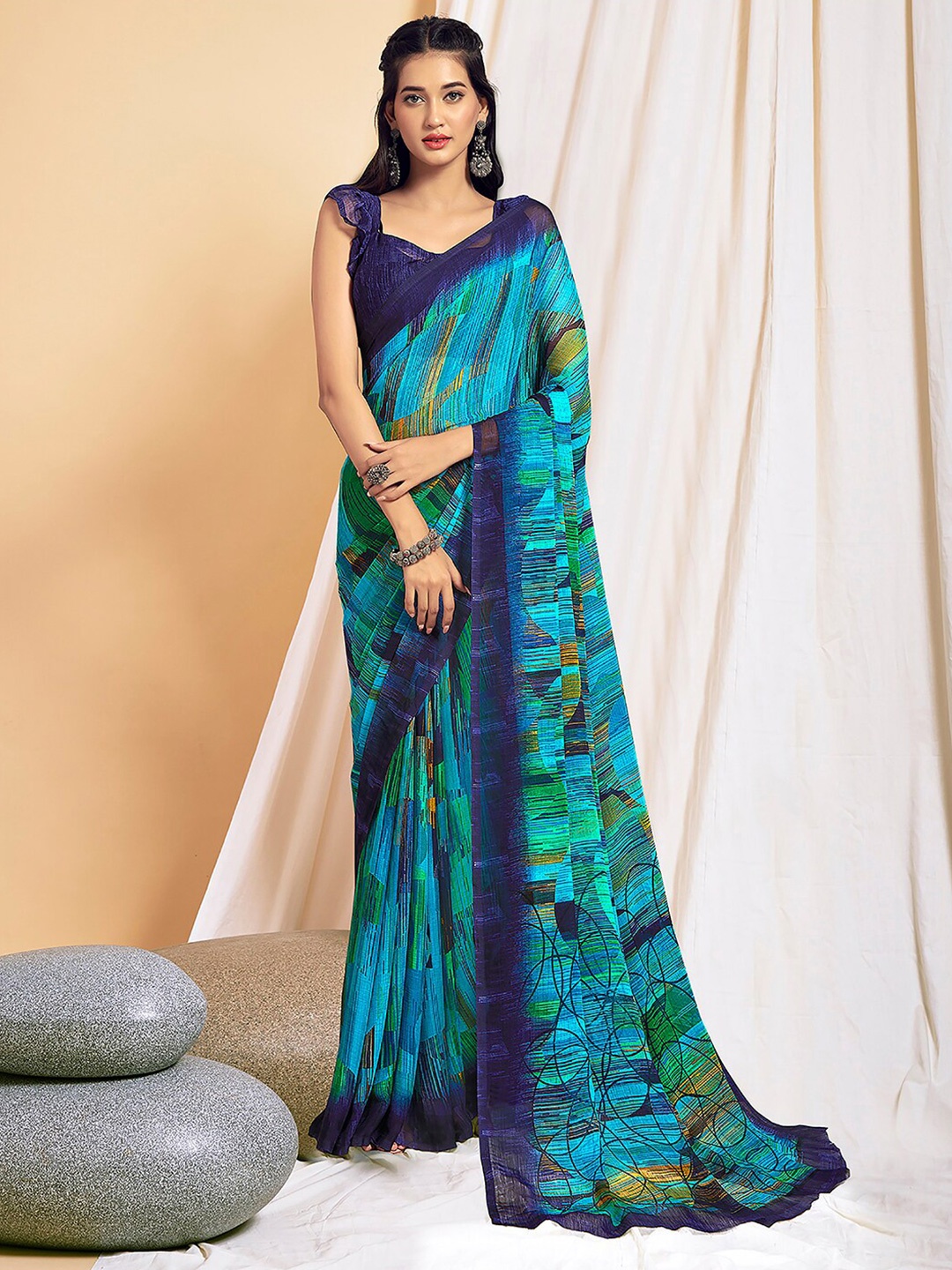 

Kasak Abstract Printed Pure Chiffon Saree, Turquoise blue