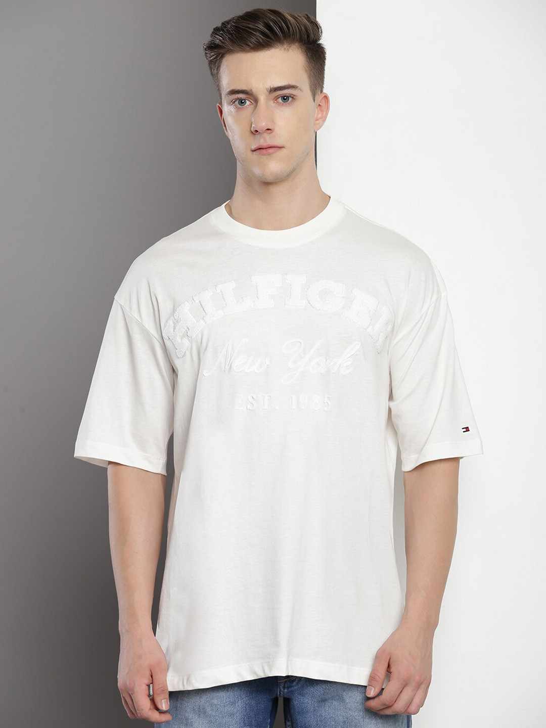 

Tommy Hilfiger Typography Self Design Drop-Shoulder Cotton T-shirt, White