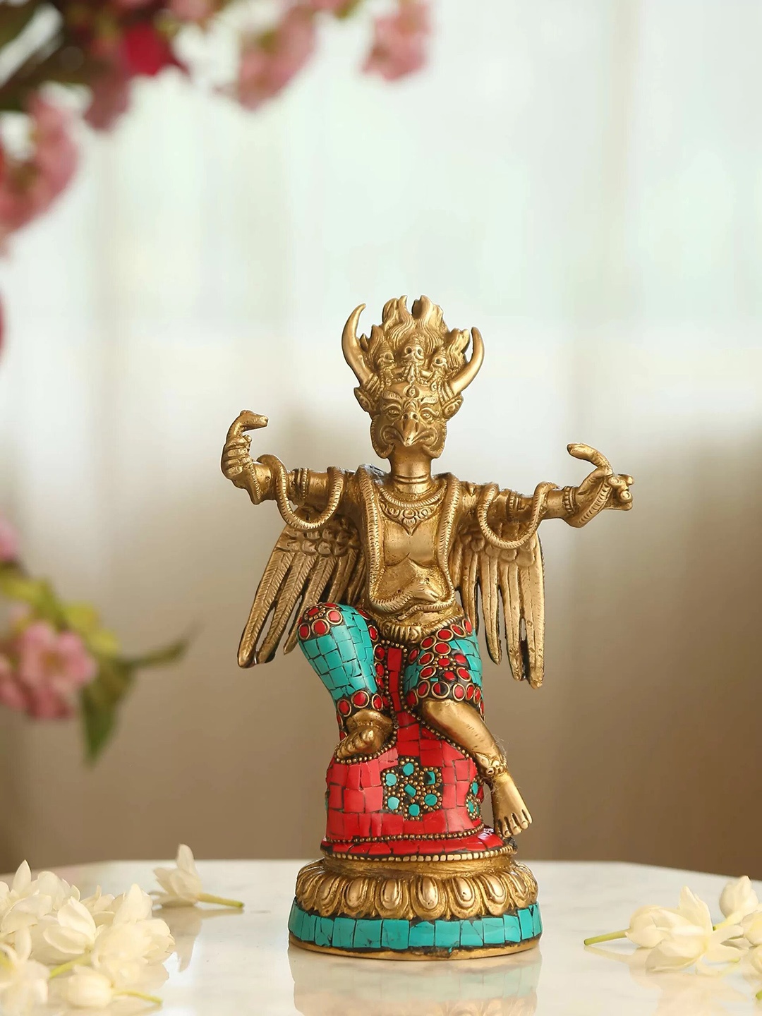 

Amoliconcepts Gold-Toned Brass Garuda In Stone Work