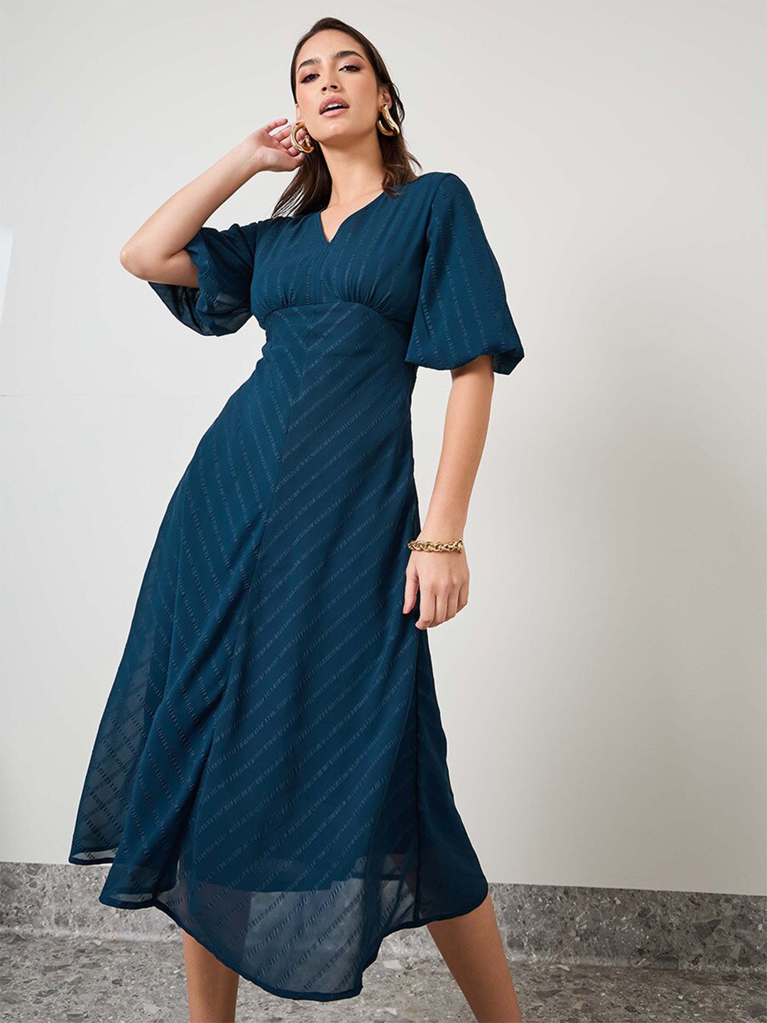 

Styli Teal Blue Self Design V-Neck Puff Sleeves A-Line Dress