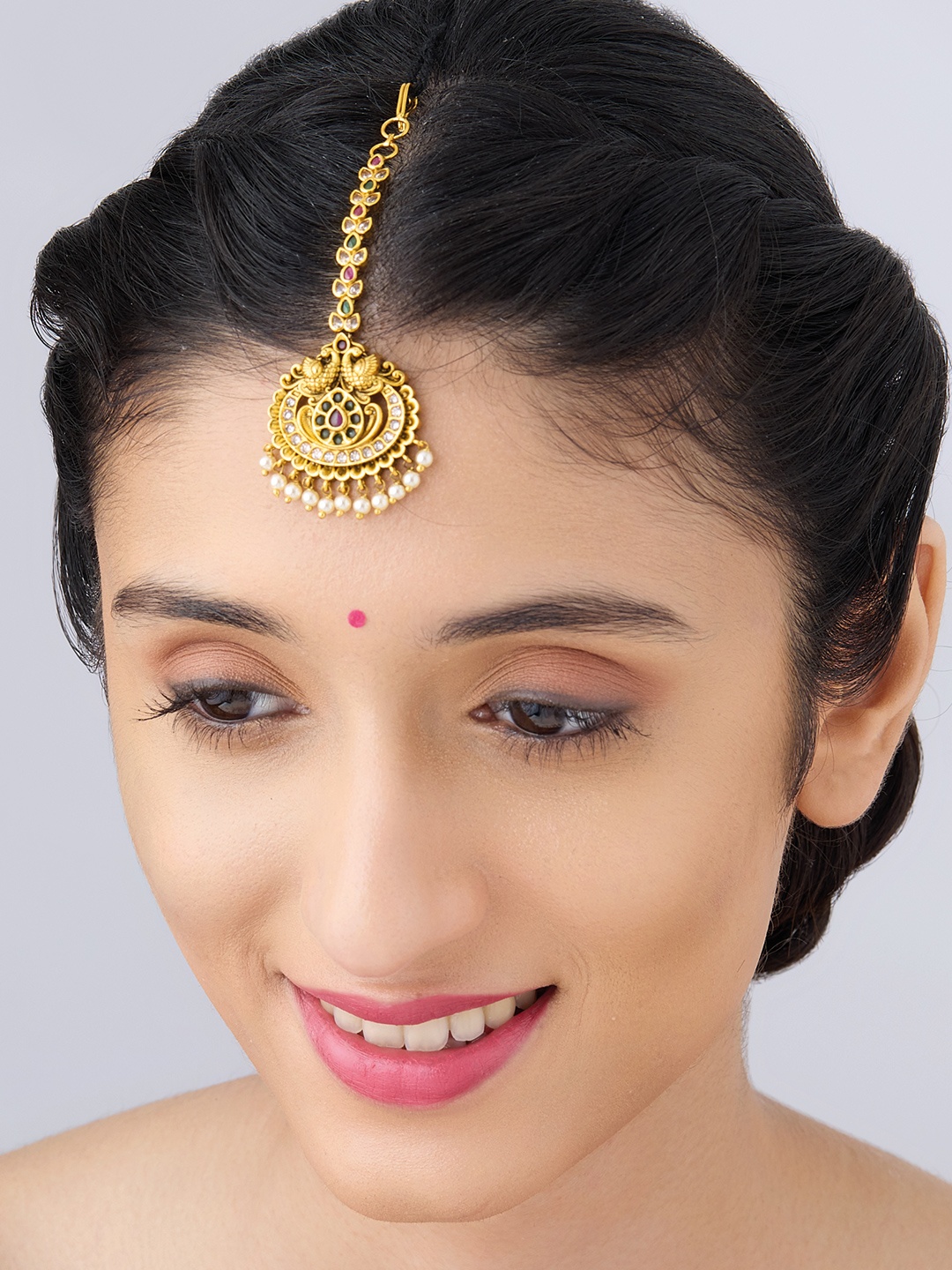 

Kushal's Fashion Jewellery Gold Plated Stones Studded and beaded MaangTikka, Red