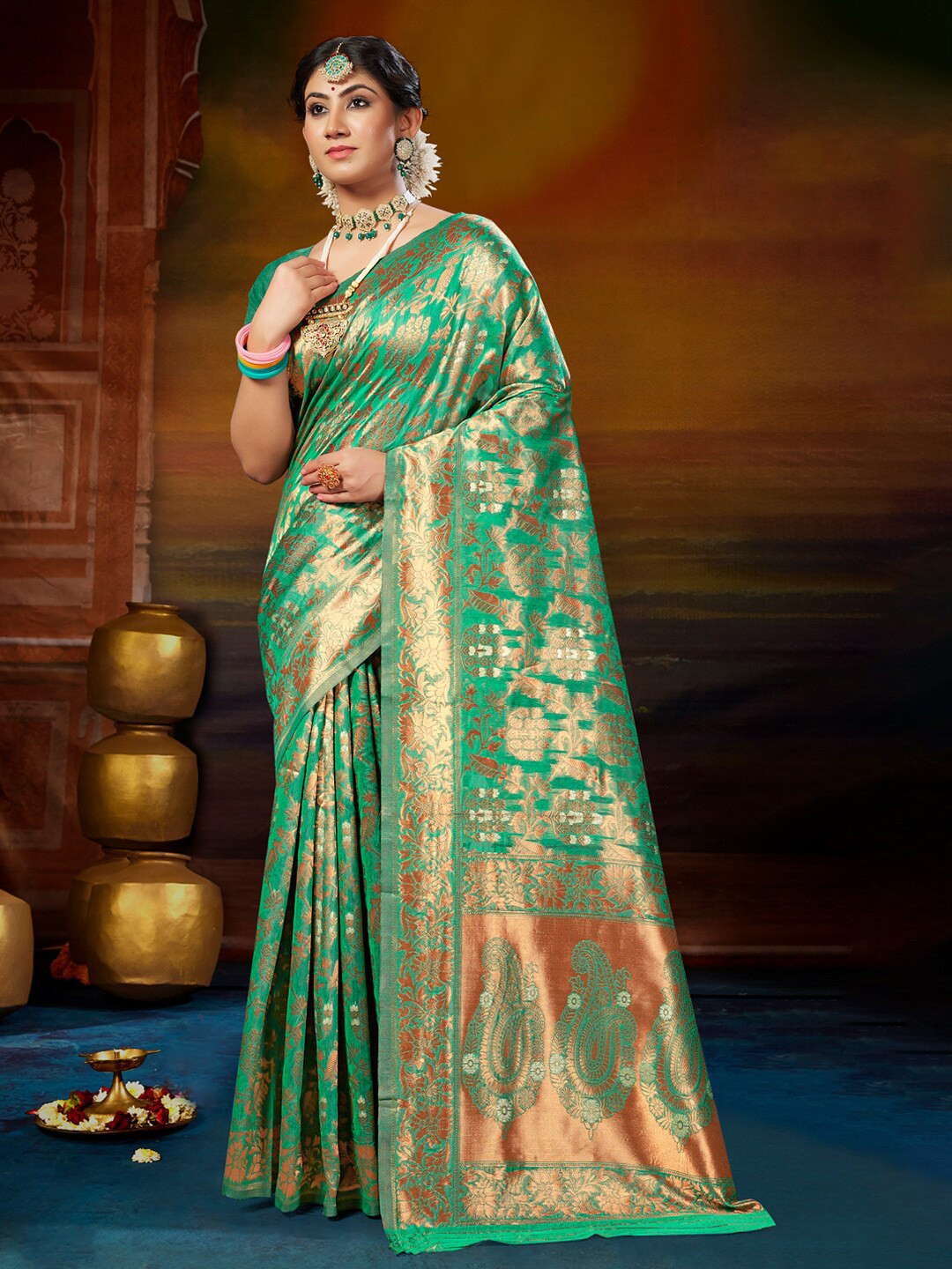 

Mitera Green & Gold-Toned Ethnic Motifs Woven Design Zari Saree