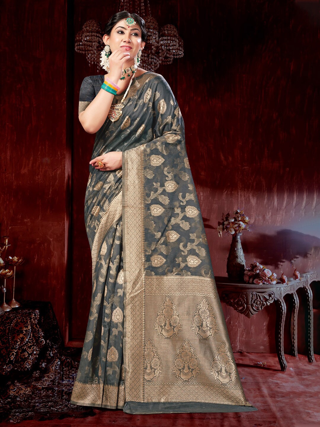 

Mitera Grey & Gold-Toned Ethnic Motifs Woven Design Zari Saree