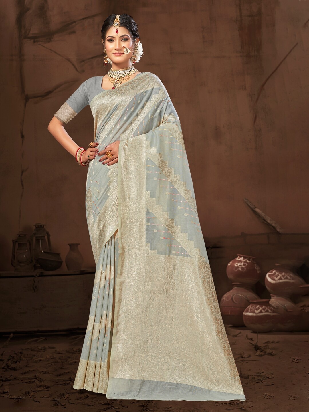 

Mitera Grey & Gold-Toned Ethnic Motifs Woven Design Zari Saree