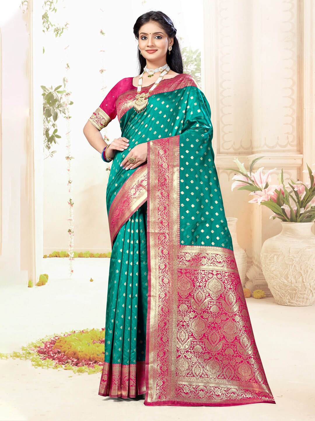 

Mitera Green Ethnic Motifs Woven Design Zari Saree
