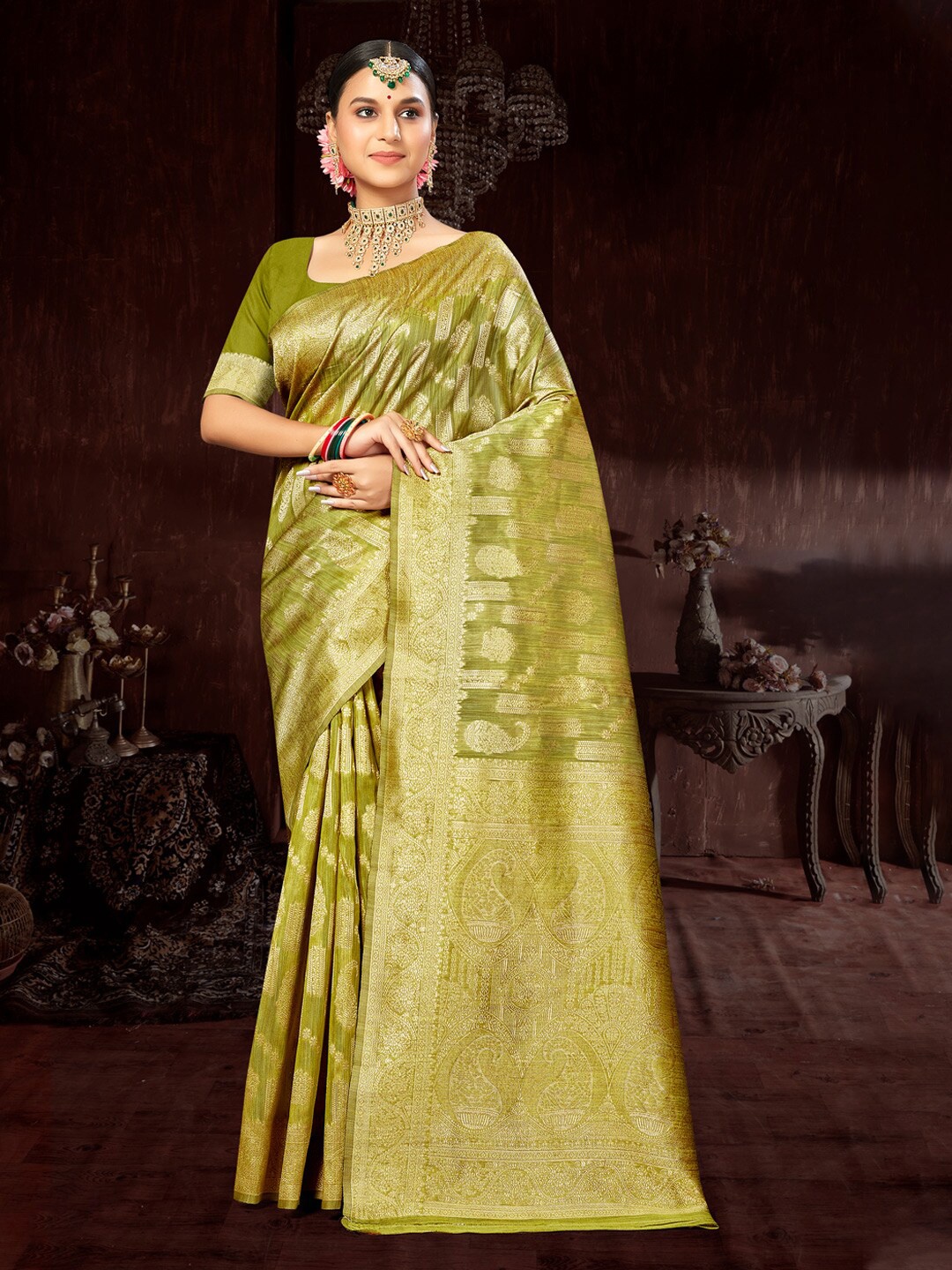 

Mitera Green Ethnic Motifs Woven Design Zari Saree