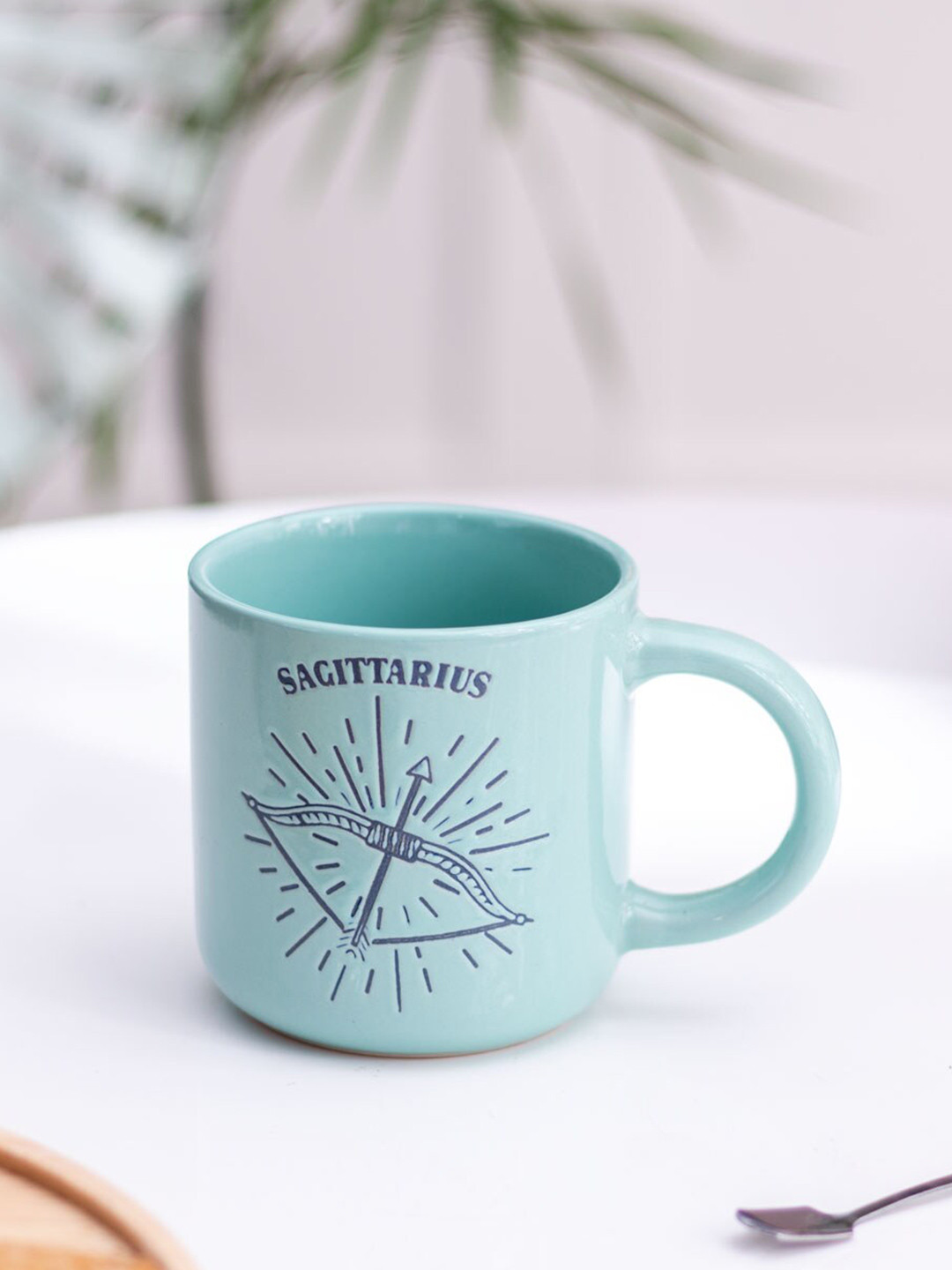 

THEDECORKART Blue & Black Printed Ceramic Glossy Mug - 300 ML