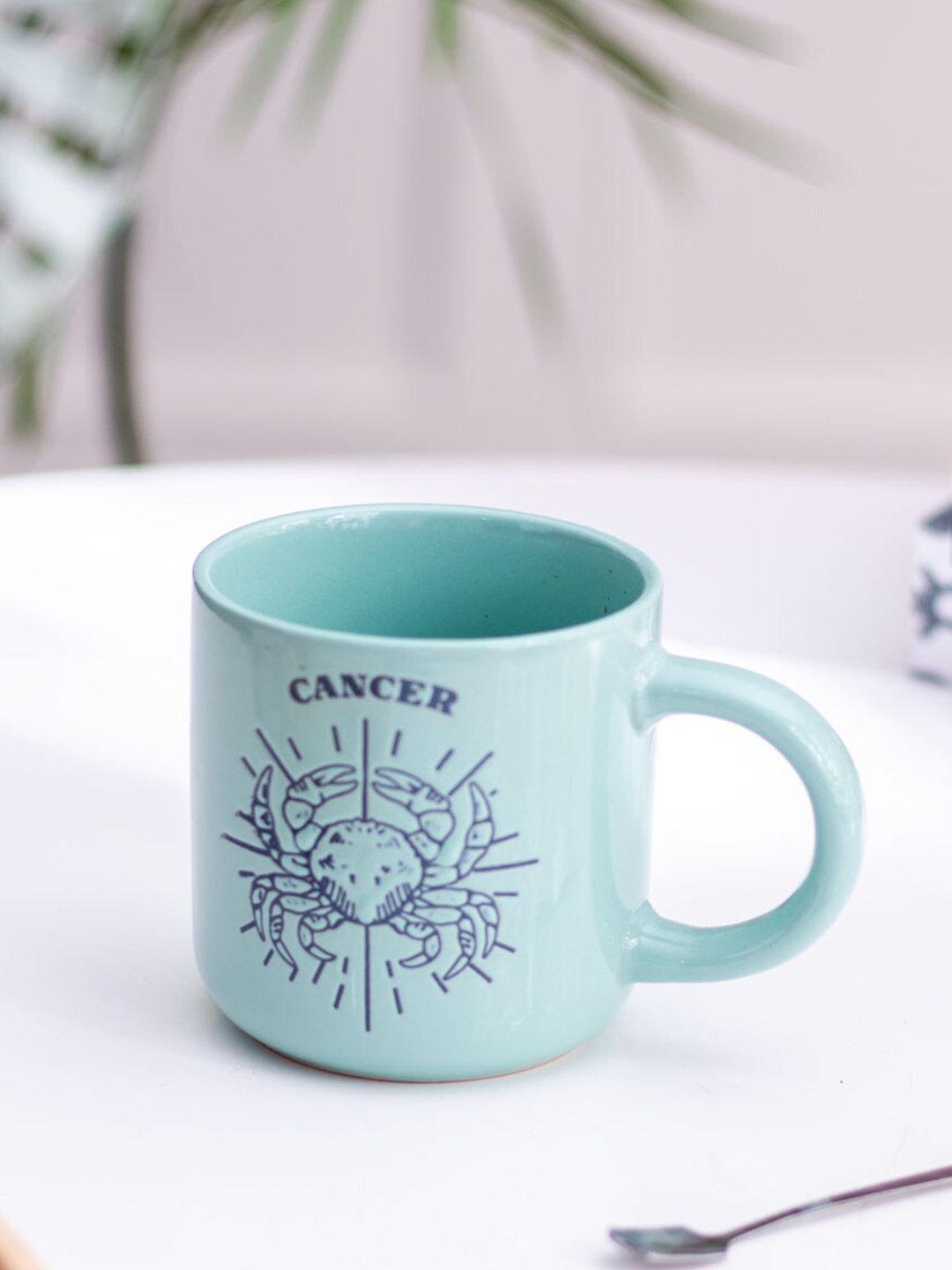 

THEDECORKART Blue Printed Ceramic Glossy Mug - 300 ML