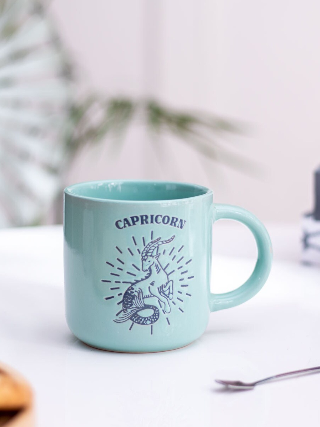 

THEDECORKART Blue Printed Ceramic Glossy Mug - 300 ML