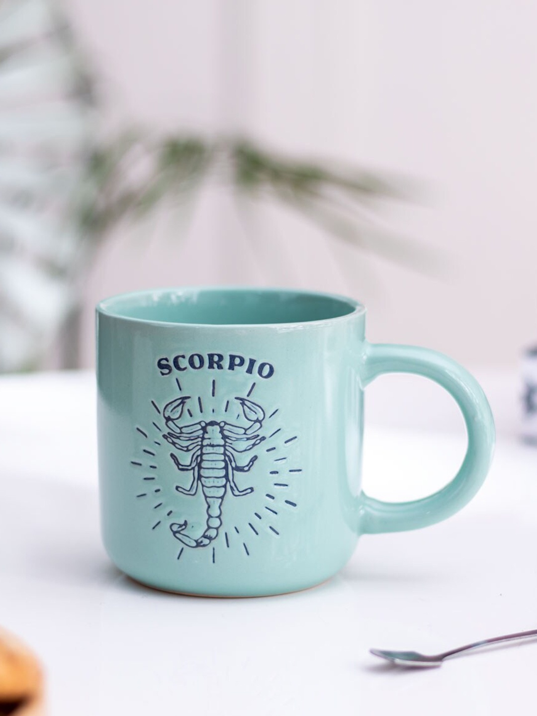 

THEDECORKART Blue Printed Ceramic Glossy Mug 300 ML