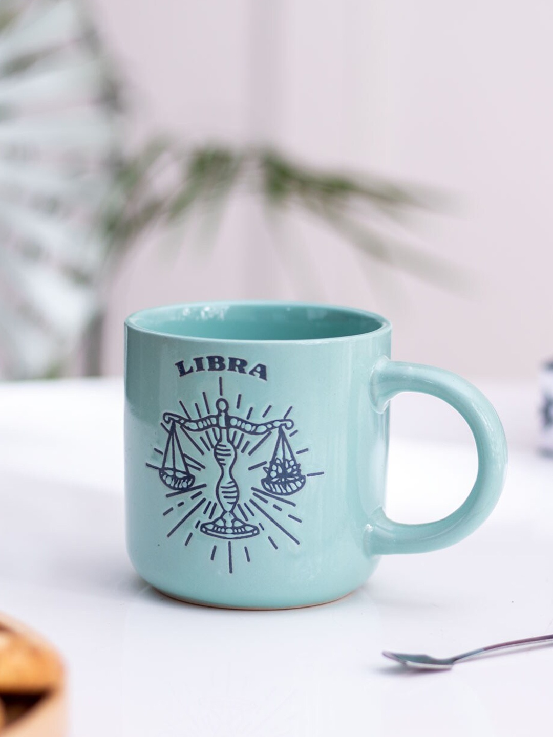 

THEDECORKART Blue Printed Ceramic Glossy Mug 300 ml