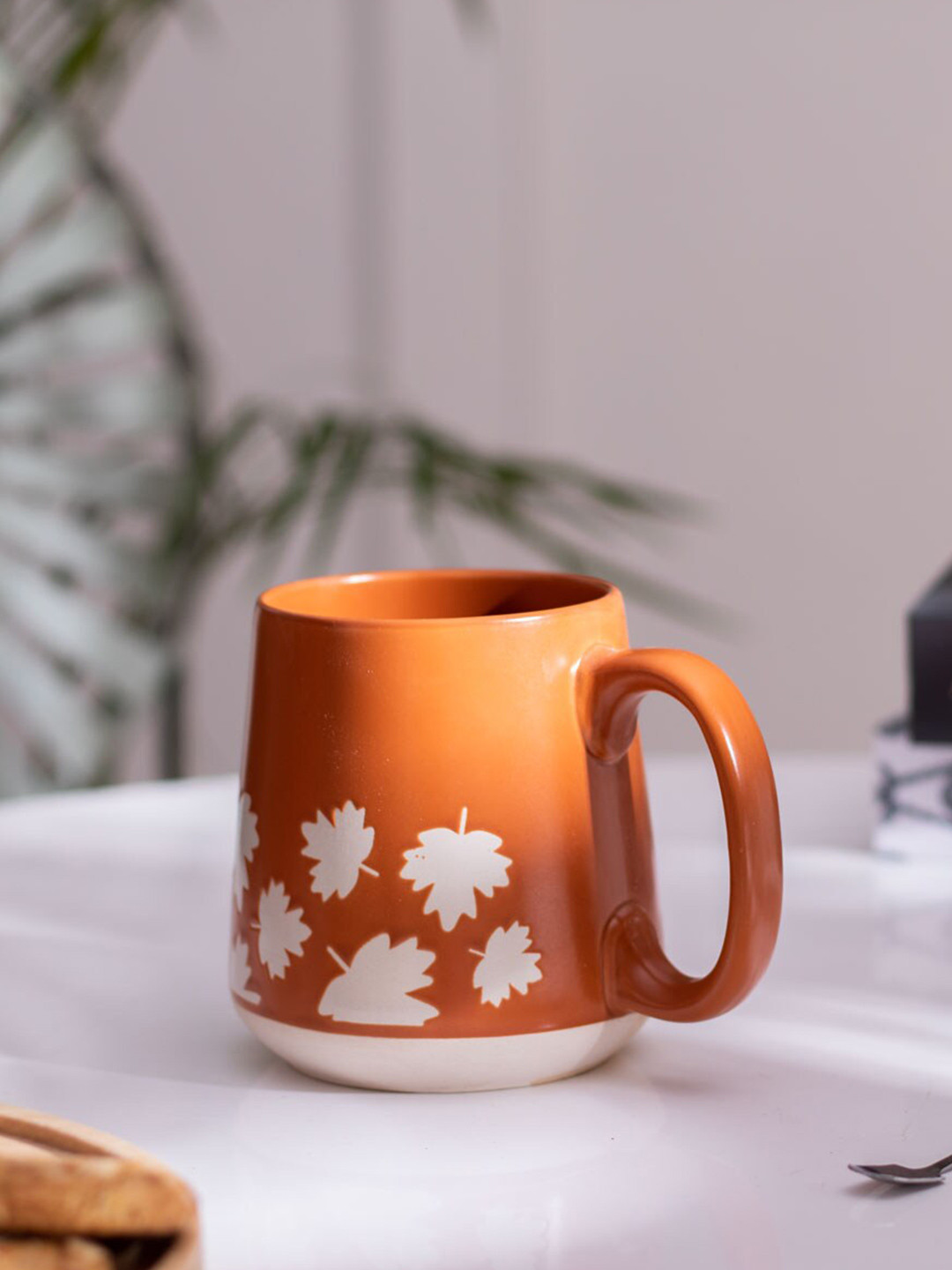 

THEDECORKART Brown & White Printed Ceramic Glossy Mug - 300 ML