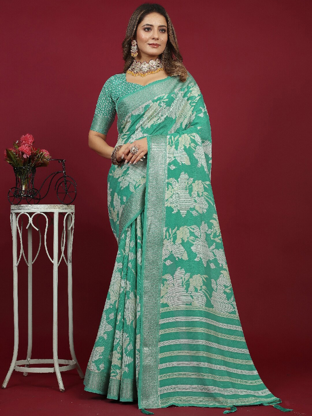 

Mitera Sea Green & White Floral Woven Design Zari Silk Cotton Saree