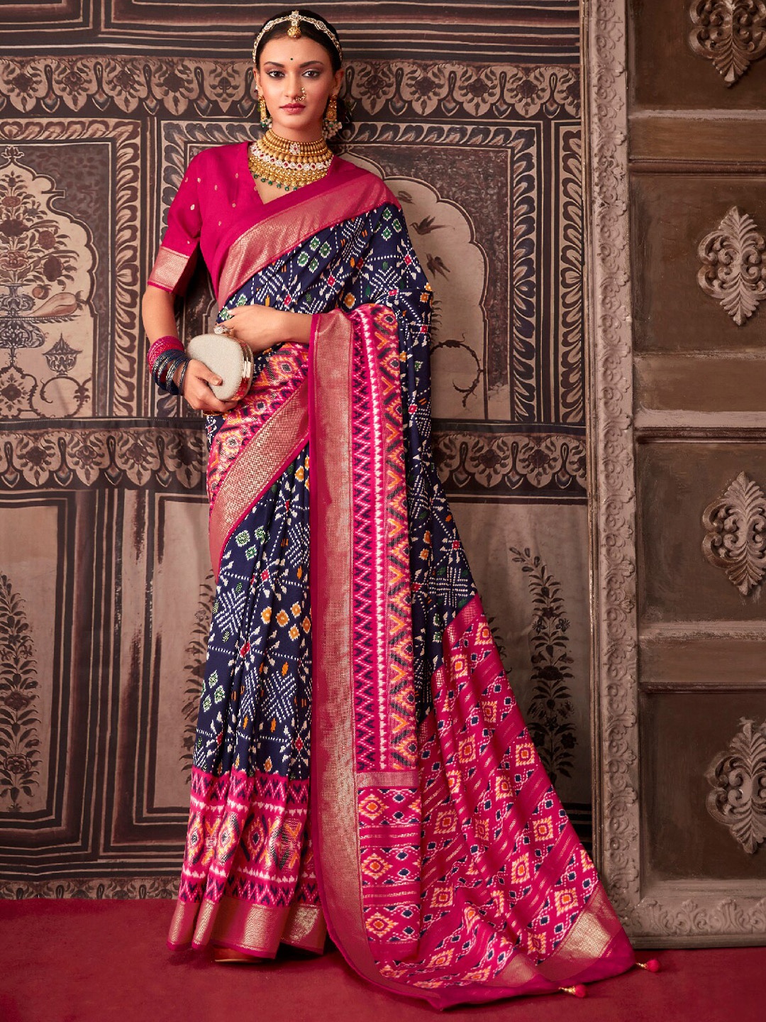 

Mitera Navy Blue & Pink Ethnic Motifs Zari Silk Cotton Ikat Saree