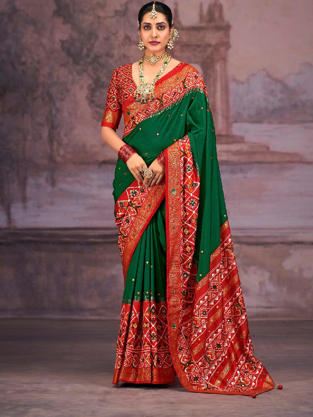 

Mitera Green & Red Ethnic Motifs Printed Mirror Work Silk Cotton Saree