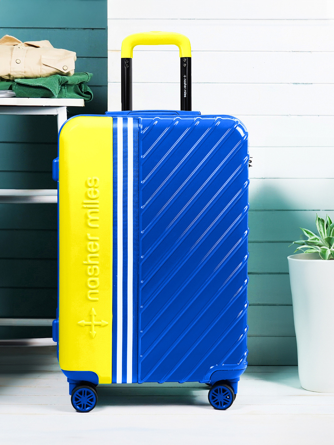

Nasher Miles Vegas Hard-Sided Colourblocked Medium Trolley Suitcase, Blue