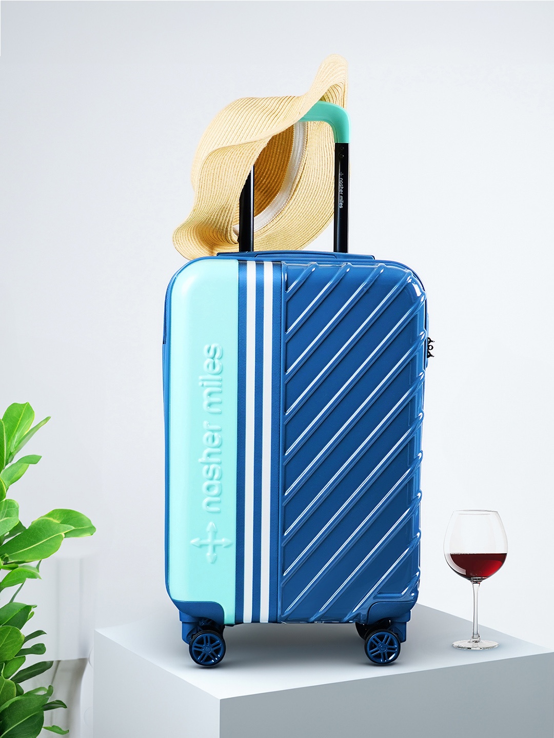 

Nasher Miles Vegas Coloublocked Hard-Sided Cabin Luggage Trolley Bag, Teal