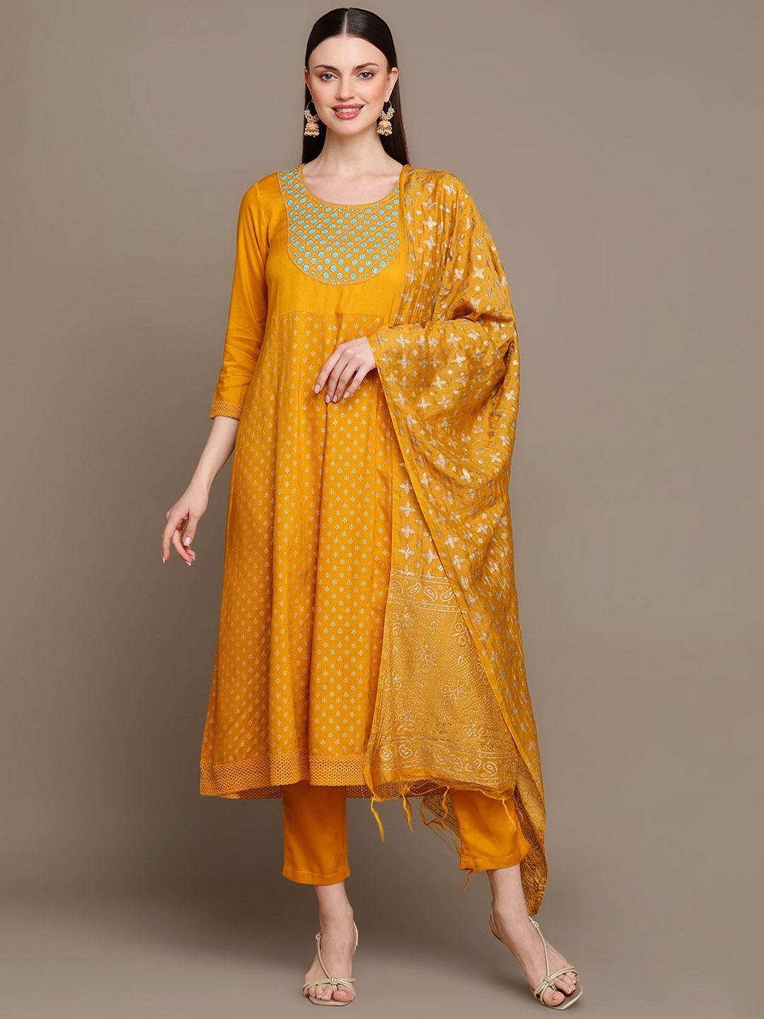 

KALINI Ethnic Motifs Printed Thread Work Panelled A-Line Kurta & Trousers With Dupatta, Mustard