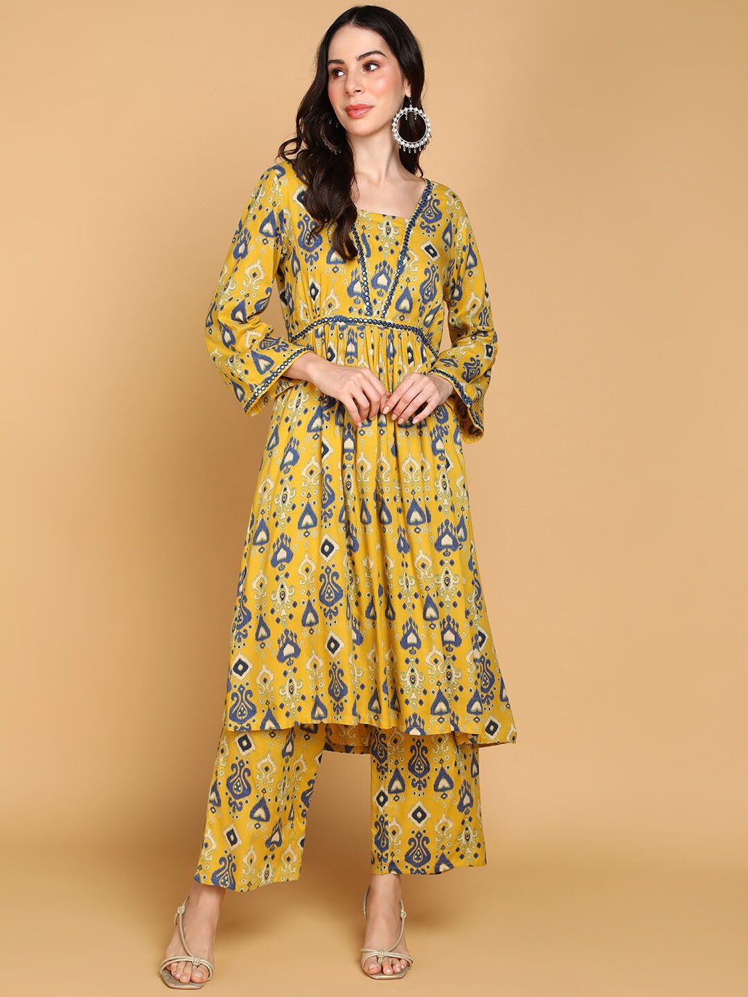 

KALINI Ethnic Motifs Printed Mirror Work Empire A-Line Kurta with Palazzo, Mustard