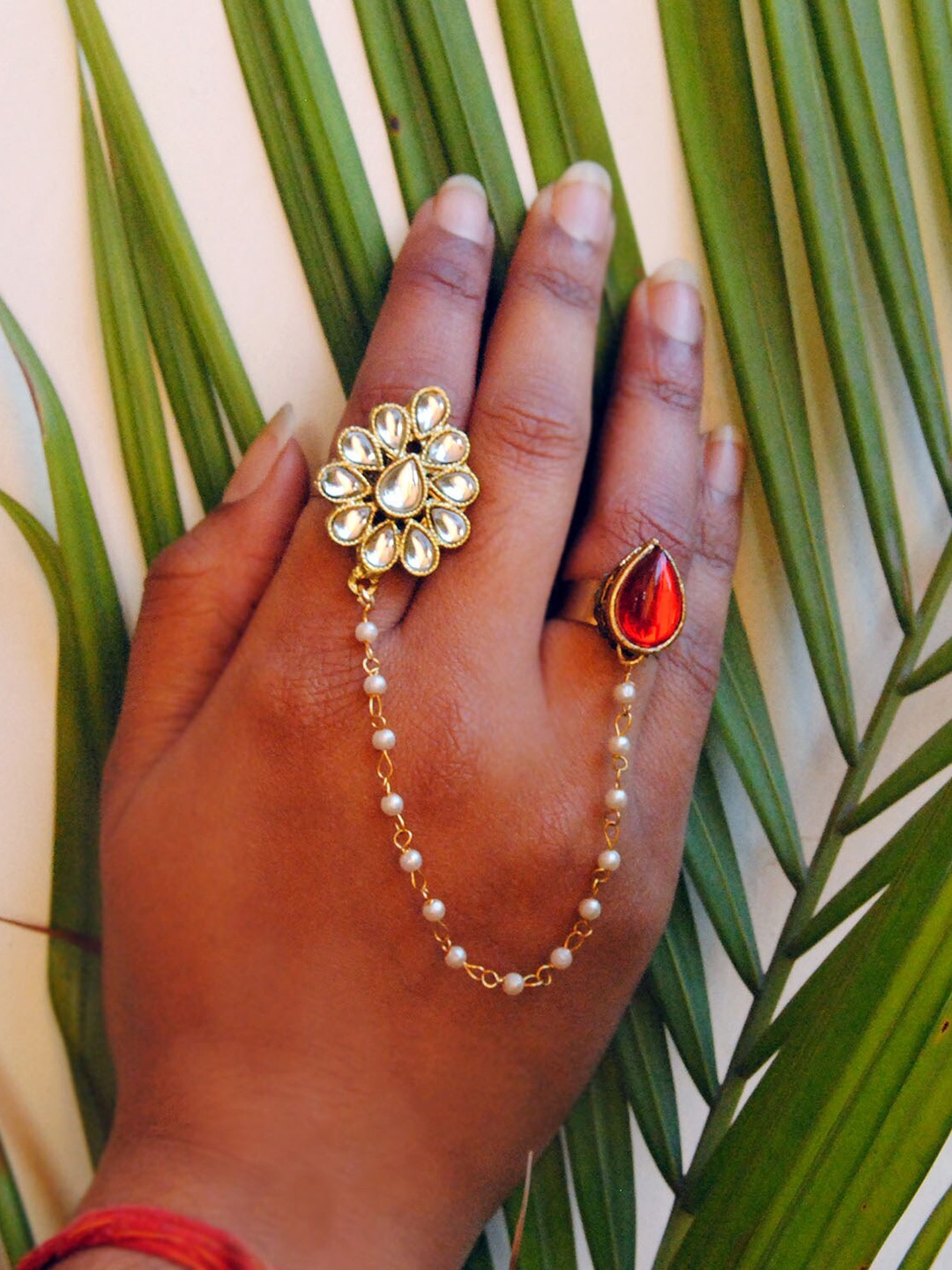

BeAbhika Floral Duo Kundan Studded Finger Ring With Chain, Gold