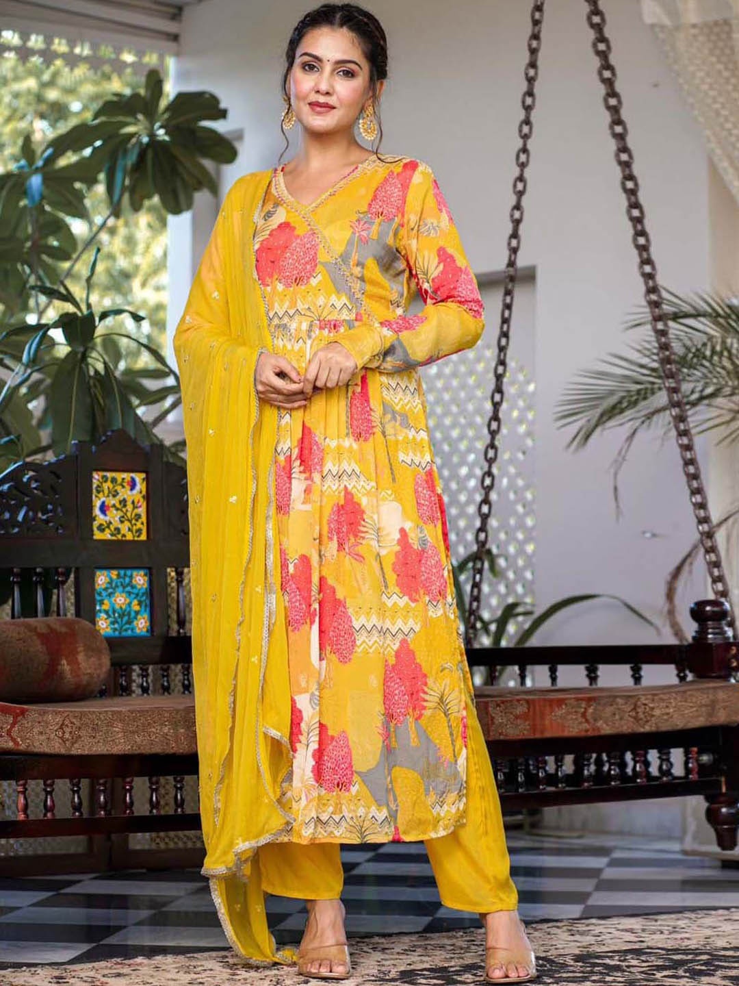 

Meena Bazaar Floral Printed Thread Work Pleated A-Line Kurta With Trousers & Dupatta, Mustard