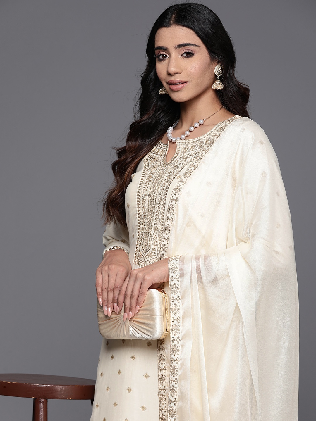 

Libas Ethnic Motifs Regular Sequinned Kurta with Trousers & Dupatta, Off white