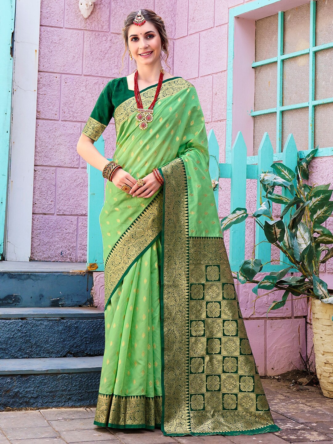 

Anouk Lime Green & Gold-Toned Ethnic Motifs Woven Design Zari Banarasi Saree