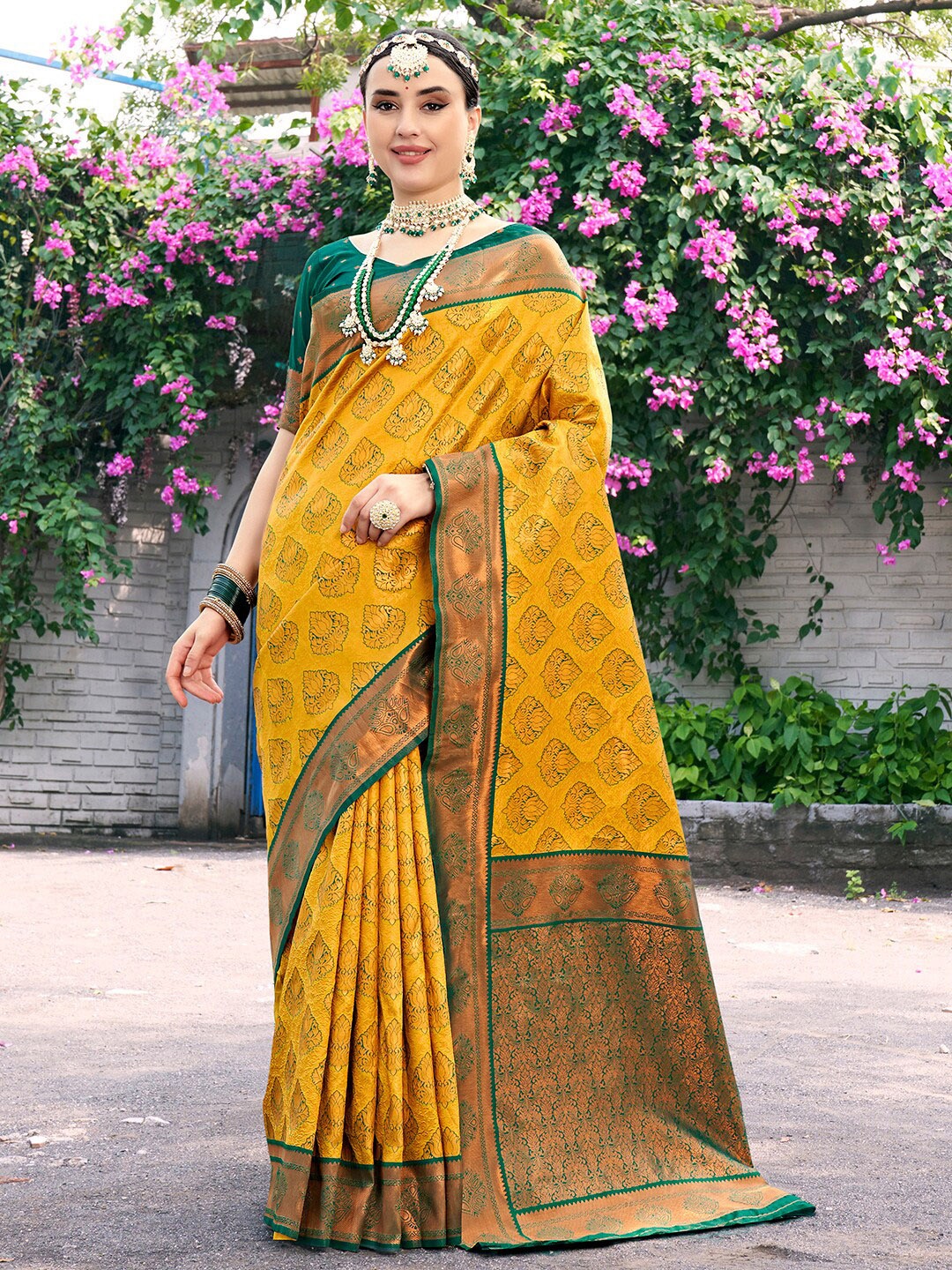 

Anouk Yellow & Green Ethnic Motifs Woven Design Zari Kanjeevaram Saree