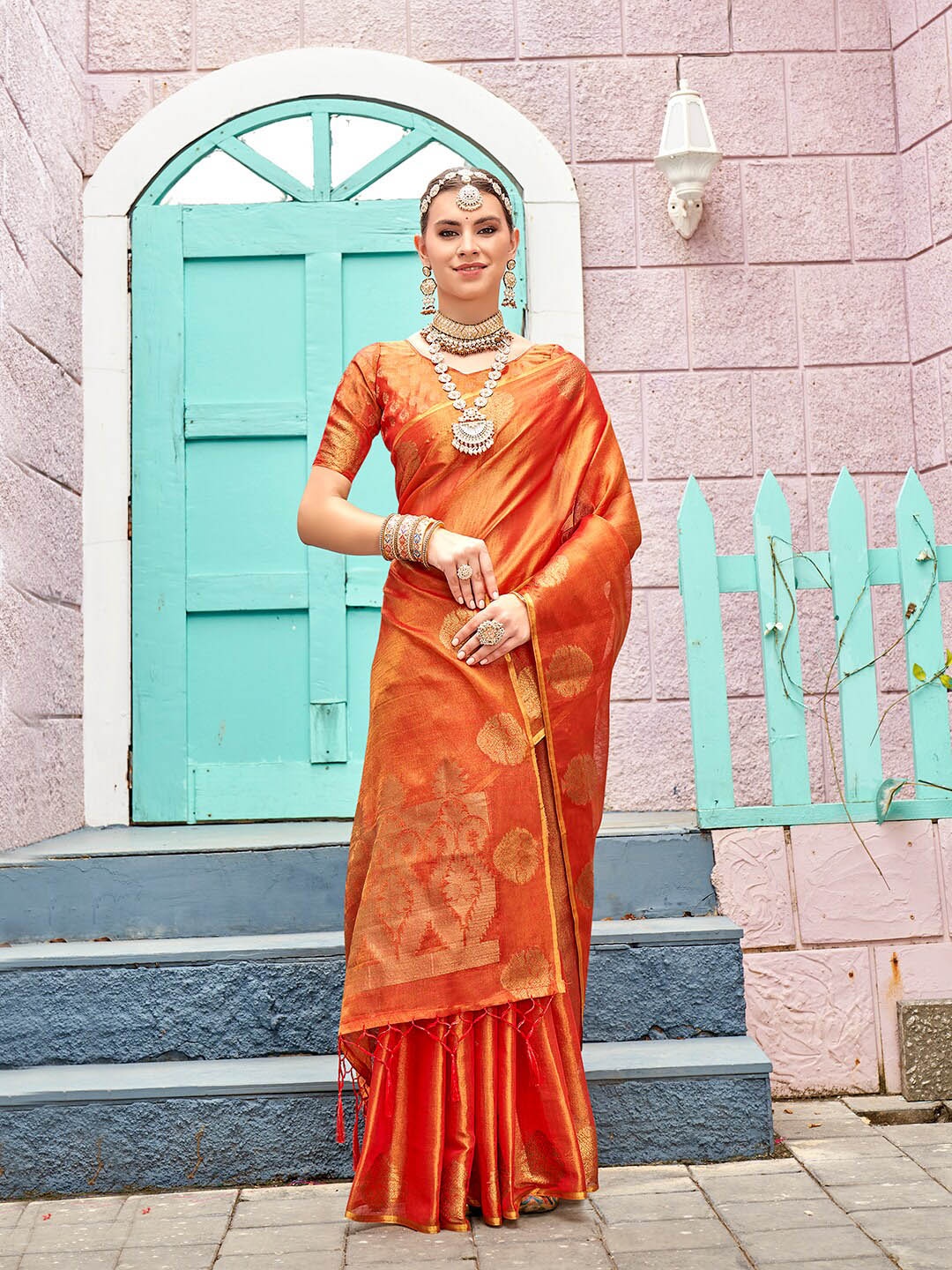 

Anouk Orange Ethnic Motifs Woven Designed Tissue Saree