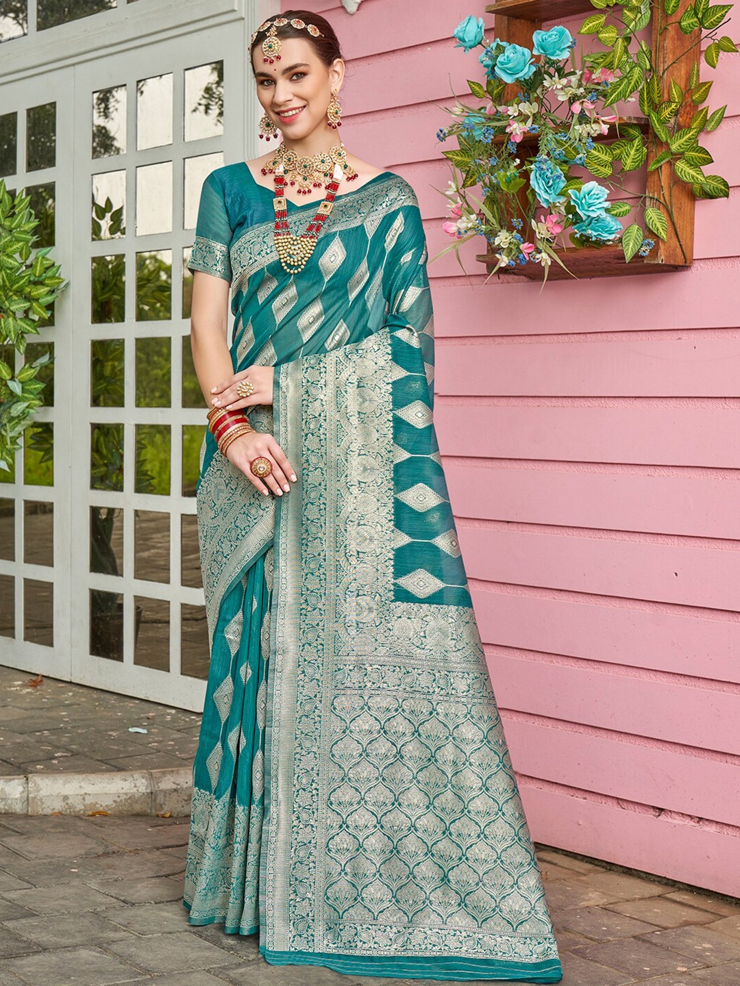 

Anouk Turquoise Blue & Gold-Toned Ethnic Motifs Woven Design Zari Art Silk Saree