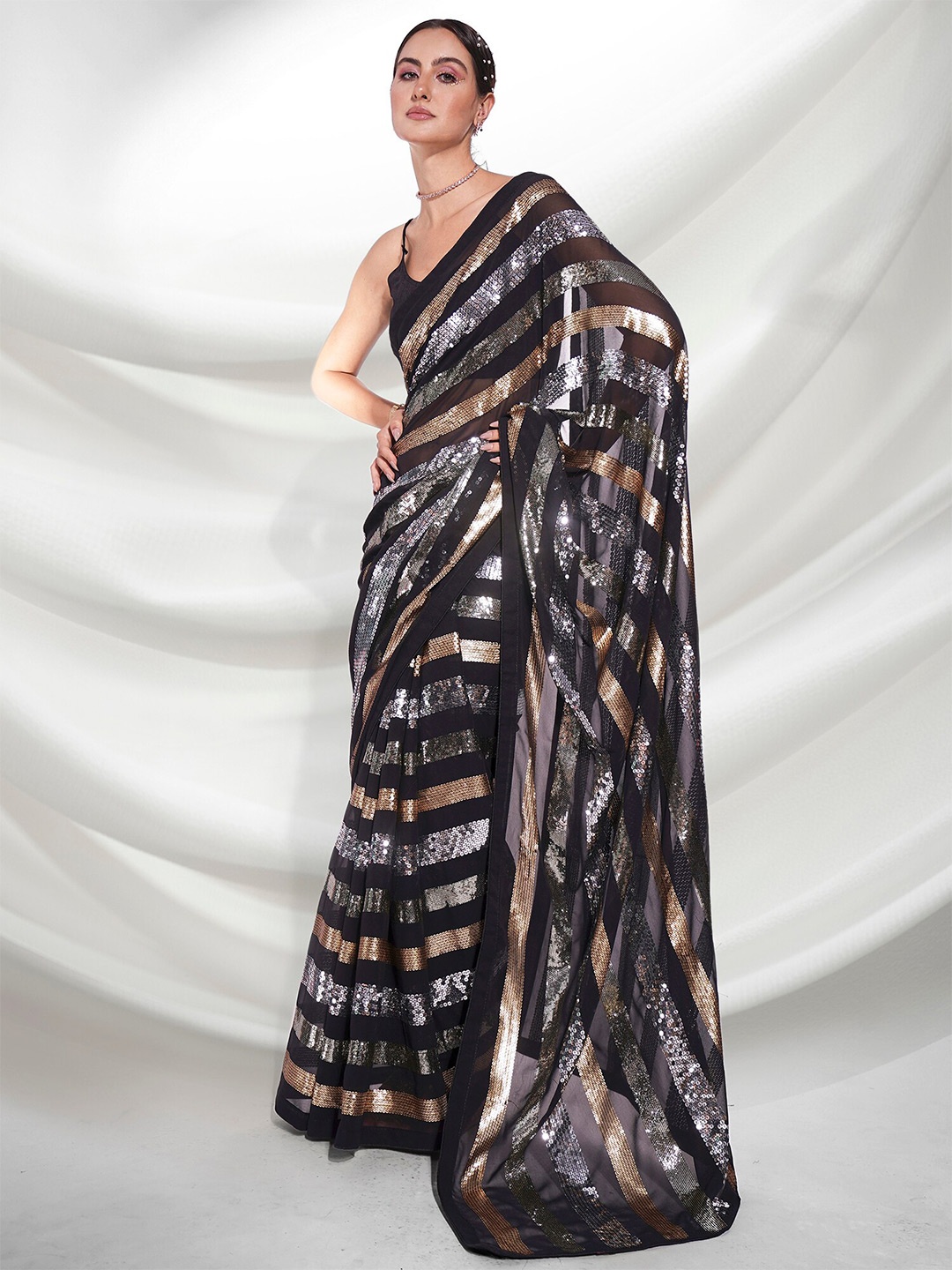 

Mitera Black & Gold Embellished Sequinned Pure Georgette Saree