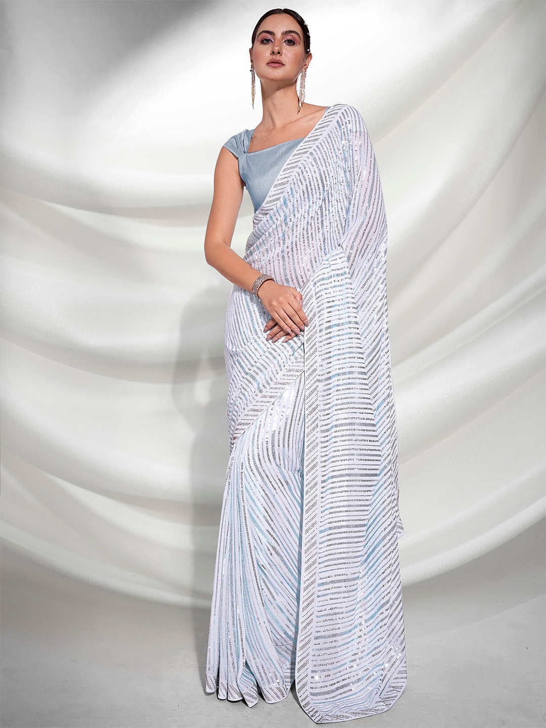 

Mitera White & Blue Embellished Sequinned Pure Georgette Saree