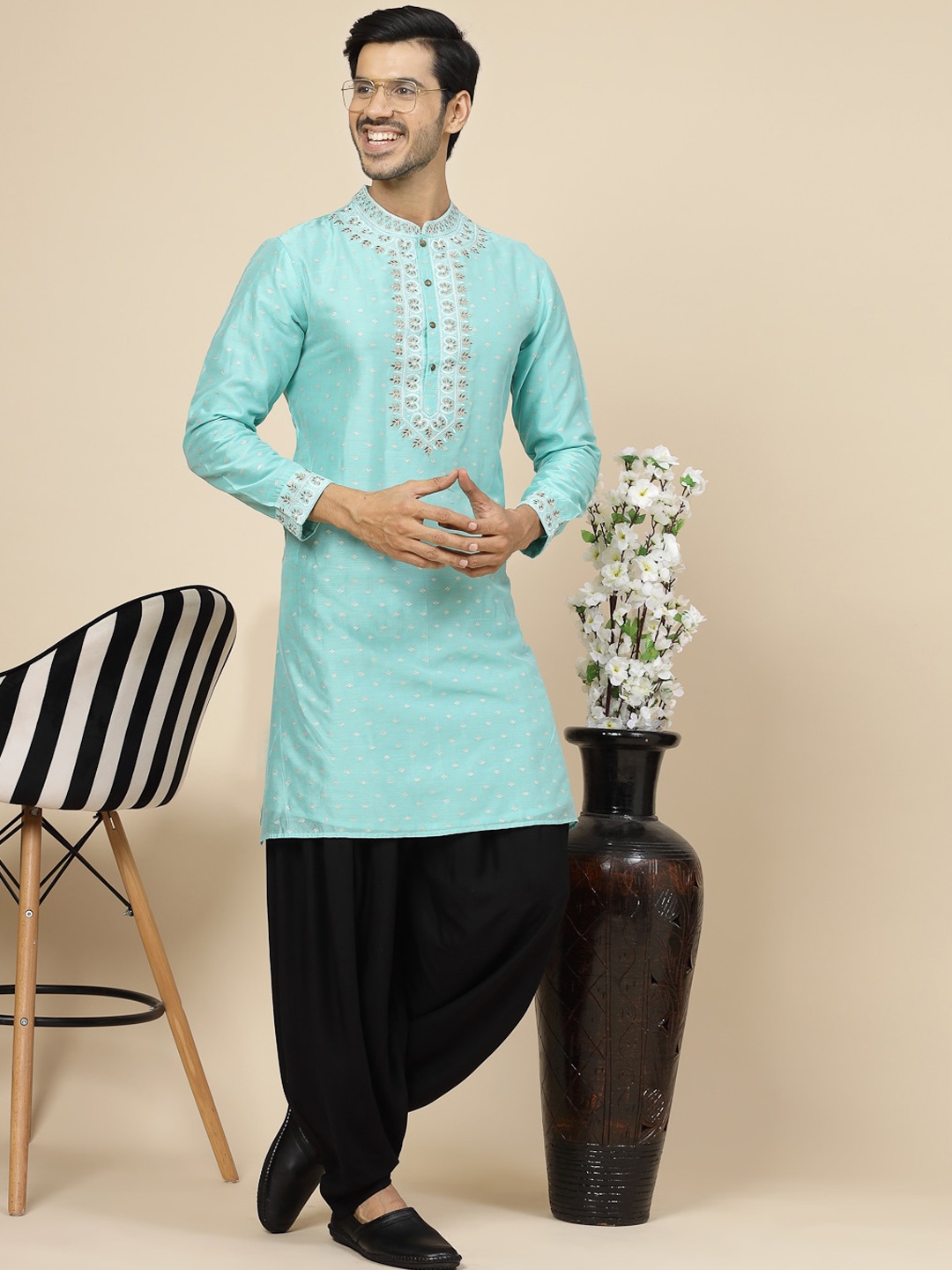 

Sangria Ethnic Motifs Embroidered Mandarin Collar Straight Kurta, Turquoise blue