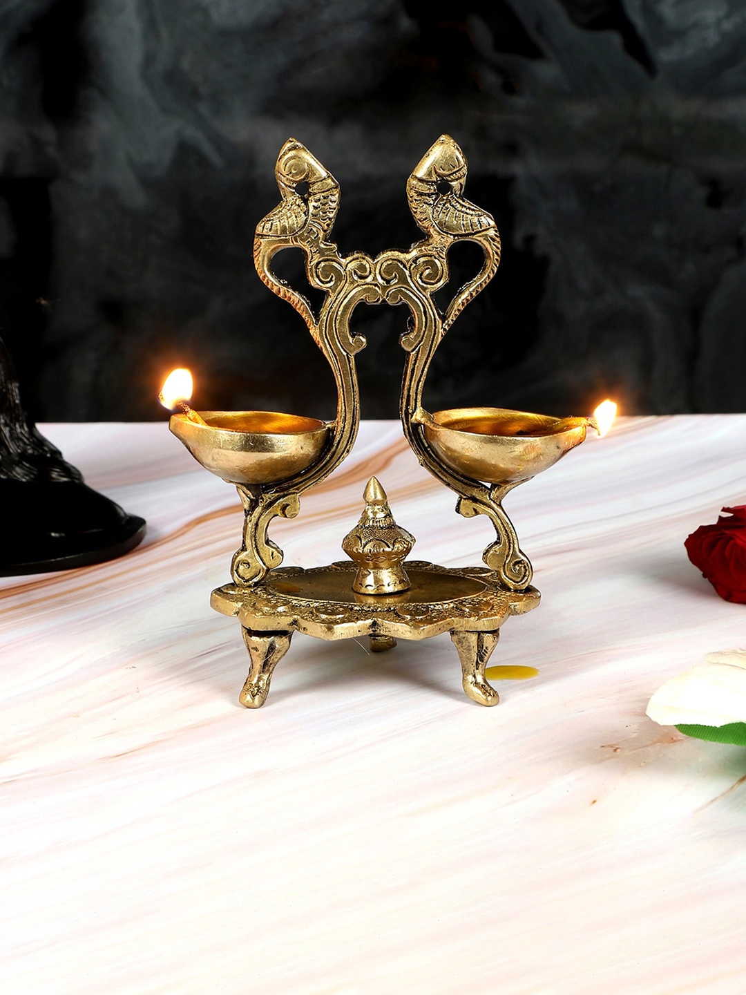

Two Moustaches Gold-Toned Peacock Design Twin Oil Wick Brass Diya