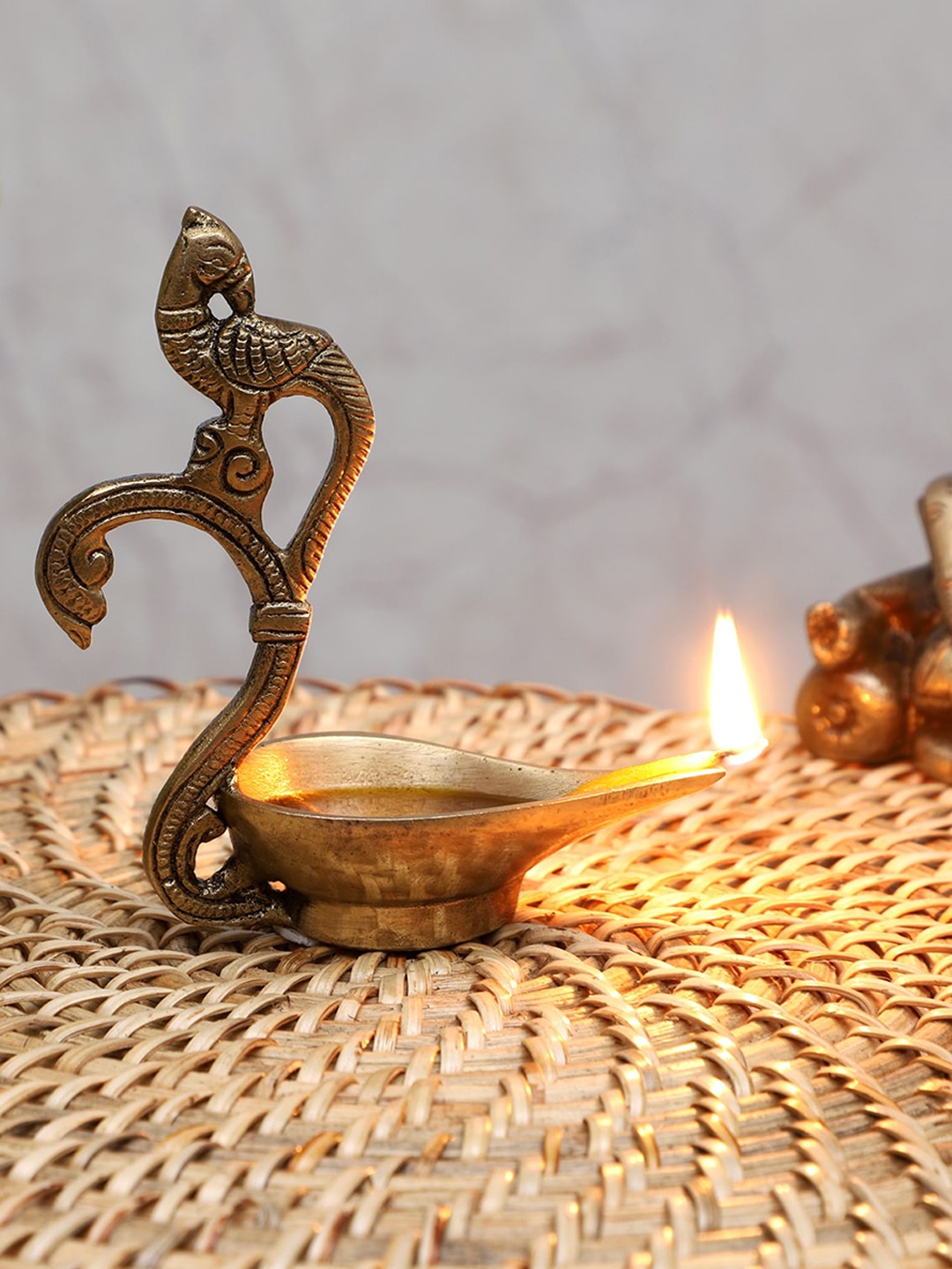 

Two Moustaches Ethnic Curved Peacock Handle Design Brass Diya, Gold