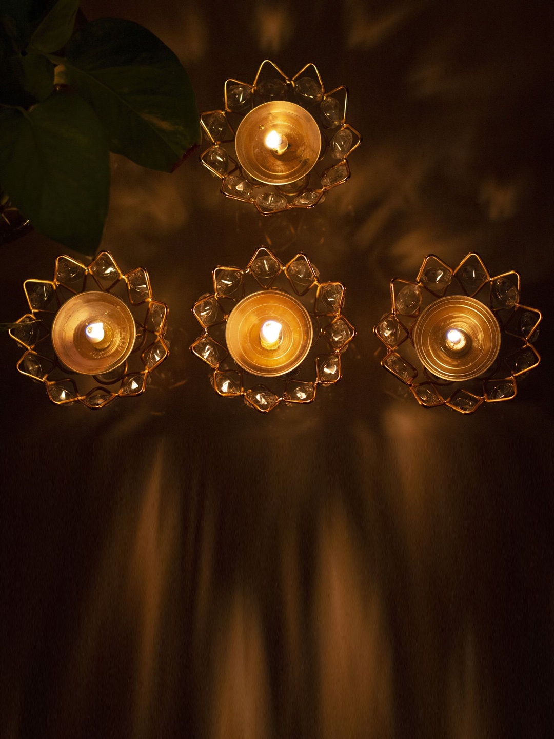 

Fashion Bizz Yellow 4 Pieces Lotus Shaped Traditional Brass Diyas