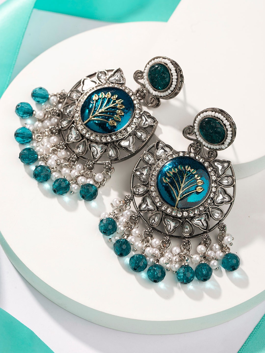 

Priyaasi Silver Plated Artificial Stones Studded Chandbali