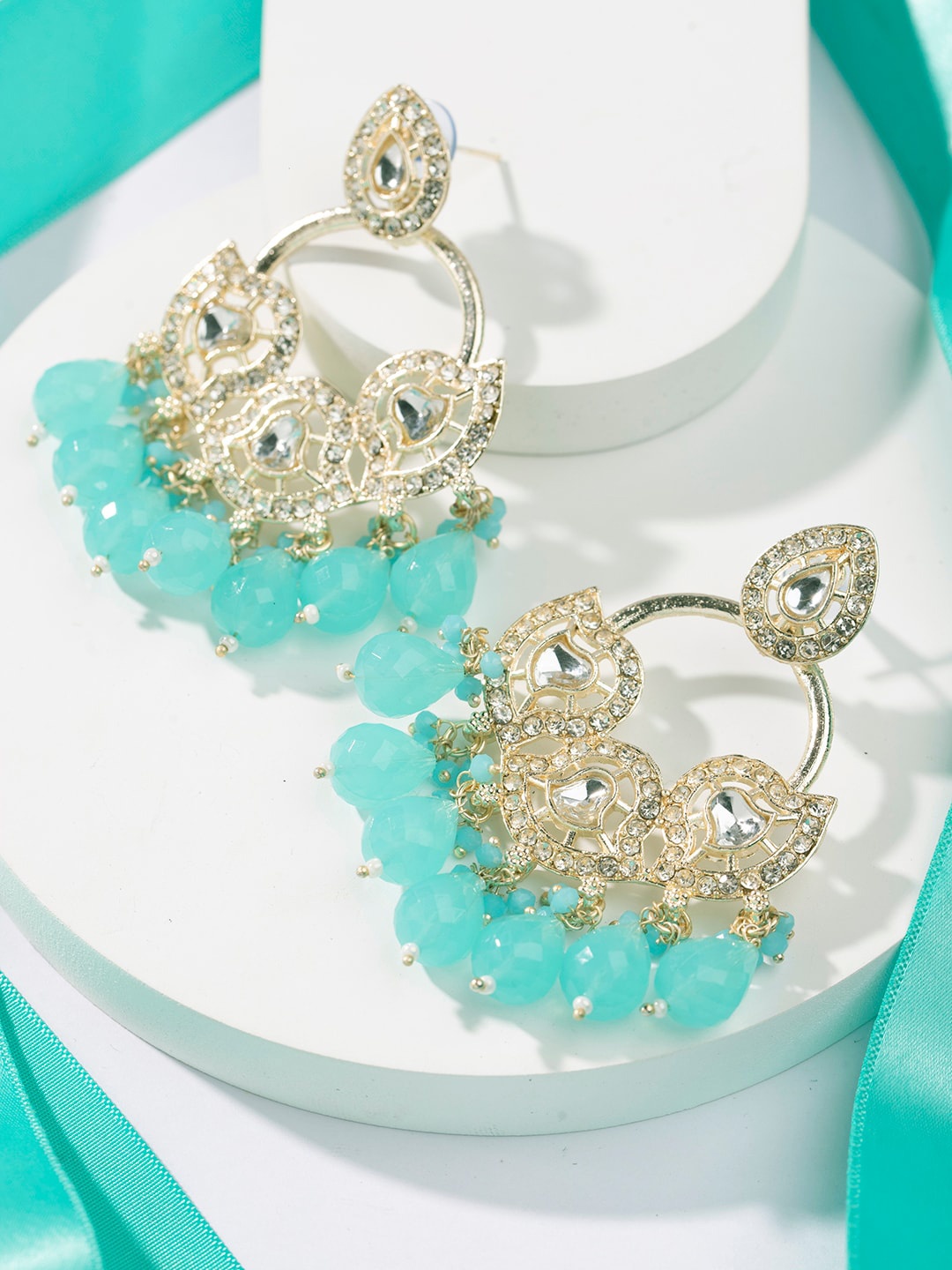 

Priyaasi Gold Plated Artificial Stones Studded Chandbalis