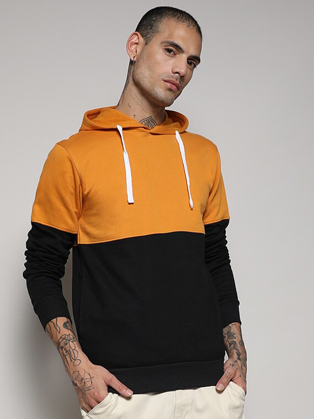 

Campus Sutra Yellow & Black Colourblocked Hooded Cotton Sweatshirt