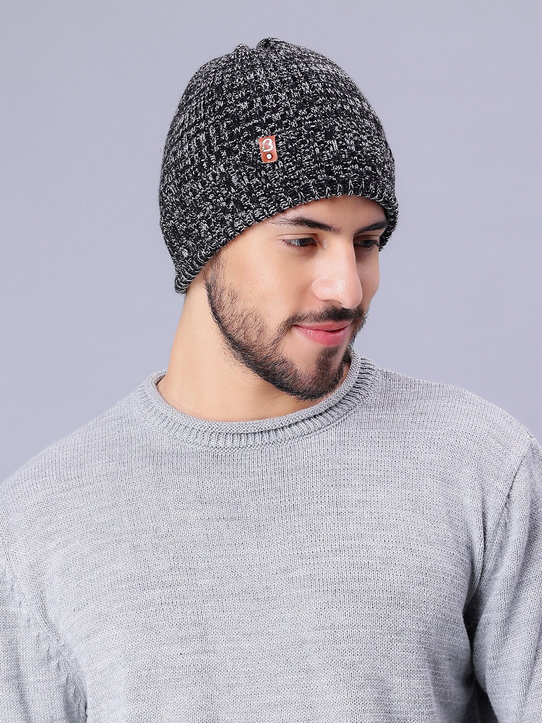 

Bharatasya Men Self Design Acrylic Beanie Cap, Black