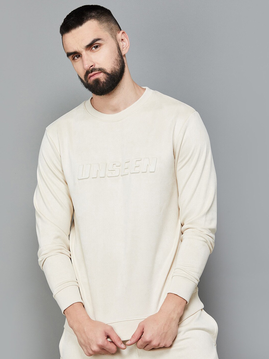 

Bossini Beige Typography Self Design Pullover