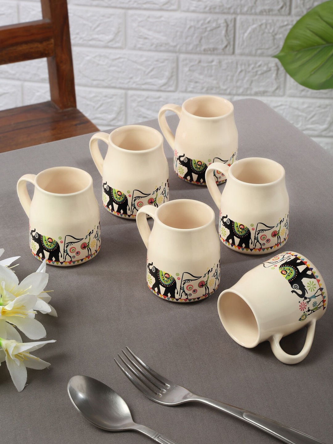 

Shilpkara White & Black 6 Pieces Ethnic Motifs Printed Ceramic Glossy Mugs