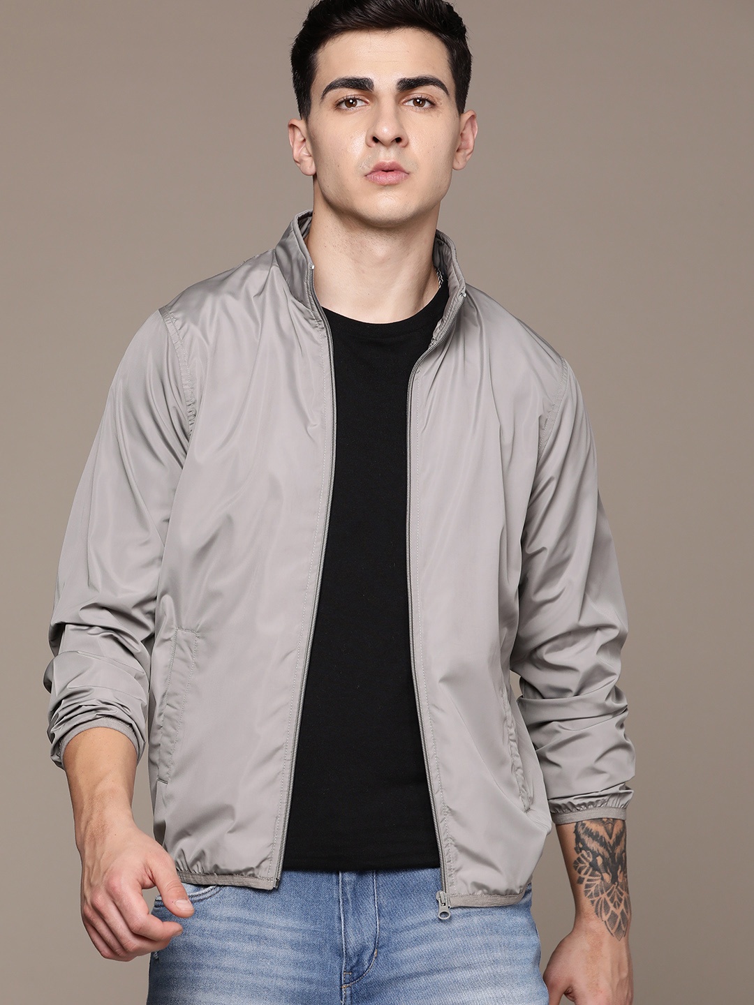 

Roadster Men Solid Windcheater Sporty Jacket, Grey