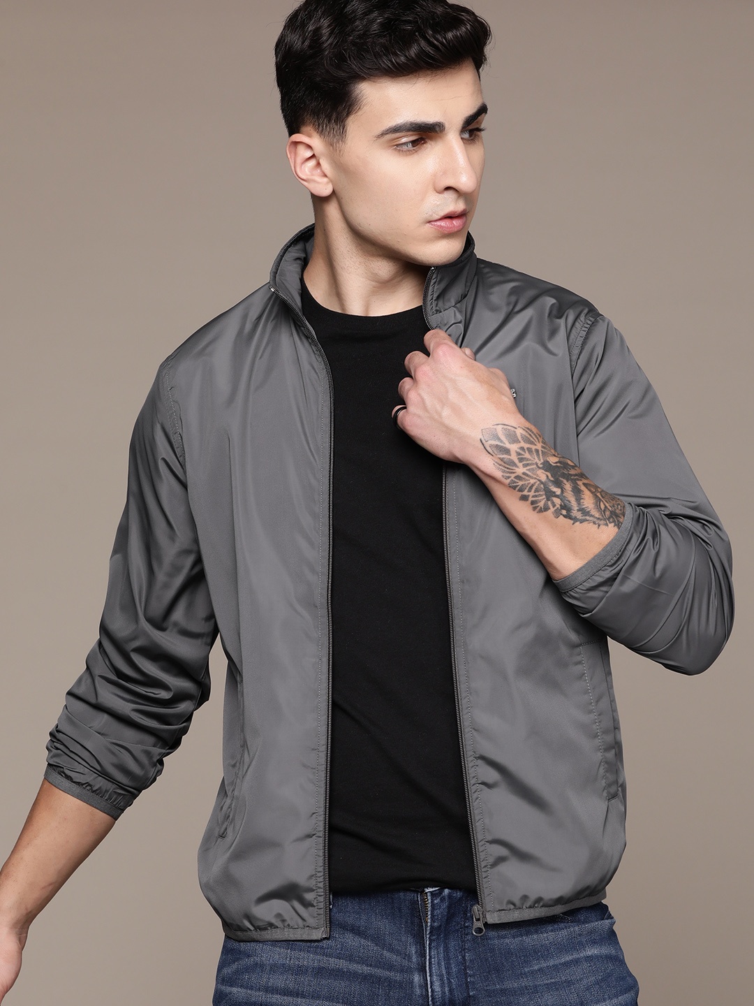 

Roadster Men Solid Windcheater Sporty Jacket, Charcoal