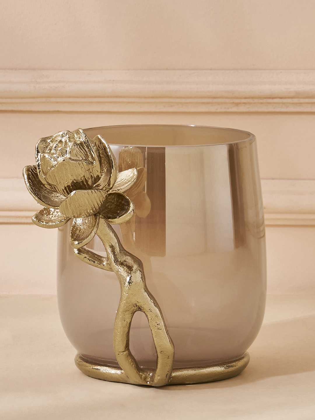 

Home Centre Eternity Vivere Gold Toned Glass Lotus Candle Holder